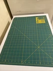 Vintage Olfa 23"X17" Rotary Mat Cutting Base Used. Price: $31.99.