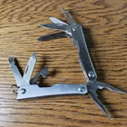 Pocket Size Multi-tool (8) With Philipps And Flat Head Screwdriver, Saw More Used. Price: $16.77.