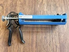 Cox Dual Tube Manual Caulking Applicator Design #2042736 Made England Nwt Open. Price: $39.00.
