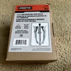Proto Puller: 7 Spread, 5-1/2 Reach, Reversible Jaws. New. Price: $79.95.